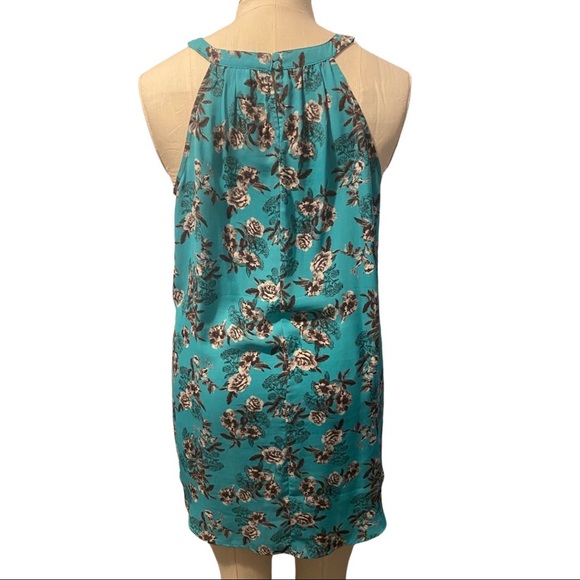 Torrid High-Lo Top with Black & White Floral Pattern on Teal Background - Picture 2 of 3